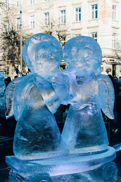 Ice sculpture on the street - angels kissing