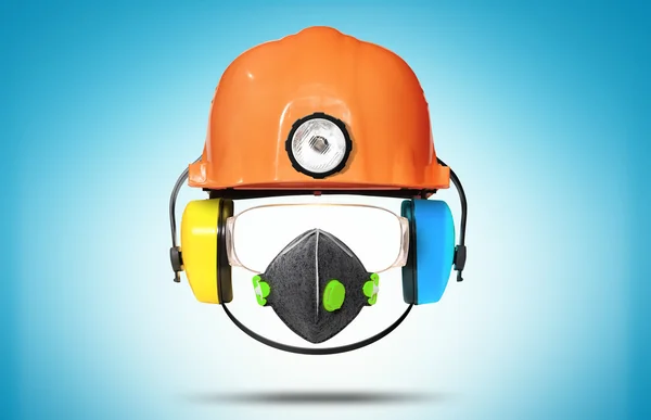 Casco de construcción con auriculares —  Fotos de Stock