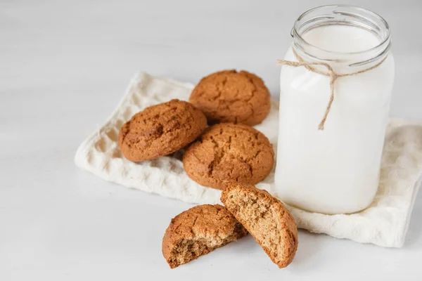Milk Glass Jar Oatmeal Cookies Napkin White Table Background Copy — Stock Photo, Image