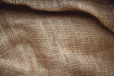 Arkaplan görüntüsü olarak çuval kahverengisi. Üst görünüm, alanı kopyala.