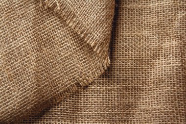 Arkaplan görüntüsü olarak çuval kahverengisi. Üst görünüm, alanı kopyala.