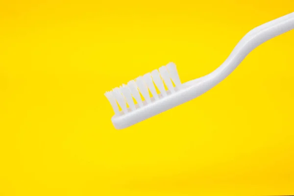 White Toothbrush Yellow Background Space Text — Stock Photo, Image