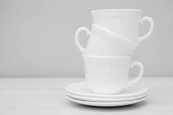 White Ceramic Cups Saucers White Table Space Text — Stock Photo, Image