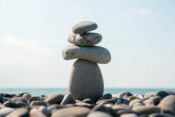 Stones Pyramid Pebble Beach Symbolizing Stability Zen Harmony Balance Concept — Stock Photo, Image