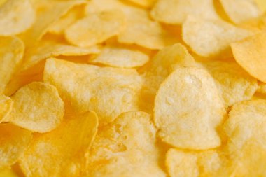Patates cipsi arka plan görüntü dokusu olarak atıştırmalık. Kopyala, metin için boşluk.