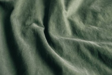Arkaplan resmi olarak yeşil kumaş dokusu. Üst Manzara. Kopyala, metin için boşluk.