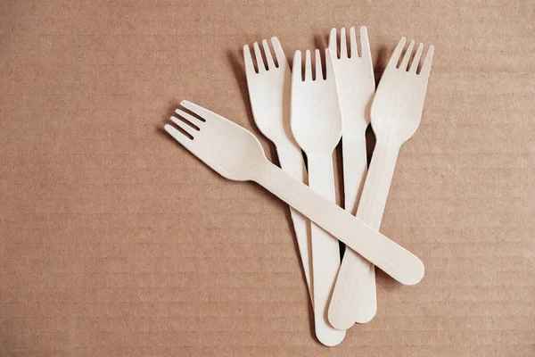 Wooden Forks Cardboard Background Eco Friendly Disposable Tableware Top View — Stock Photo, Image