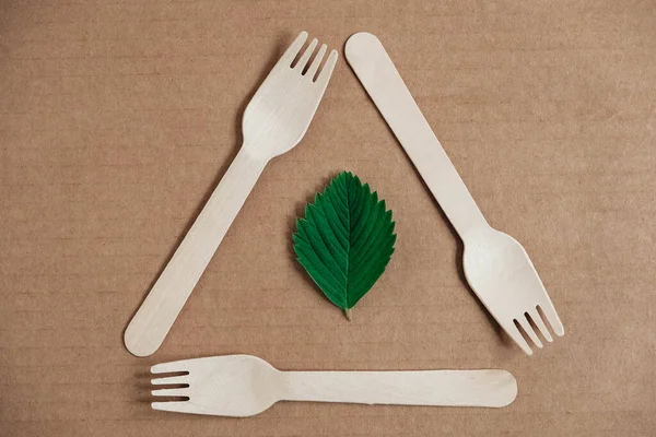 Wooden Forks Cardboard Background Eco Friendly Disposable Tableware Top View — Stock Photo, Image