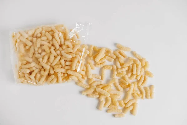 Corn Sticks Plastic Bag White Background Top View Copy Empty — Stock Photo, Image