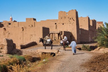 Rissani, Morocco - Oct 18, 2019: People at the Kasbah of Rissani in Morocco, Africa clipart