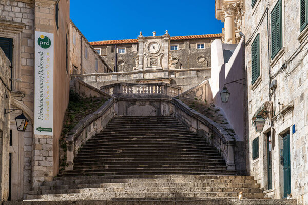 Dubrovnik, Croatia - Jun 21, 2020: Jesuits staircase, the grand staircase that leads from Gundulic Square to the square in front of Collegium Ragusinum and St. Ignatius Church. Walk of shame staircase