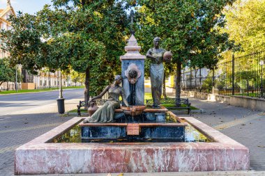 İspanyol şehri Cordoba, Endülüs, İspanya 'daki Jardines de la Merced Gardens' ın içindeki plaza de colon meydanında yer alan çeşme.