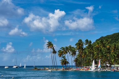 Marigot Bay in St Lucia. Marigot Bay is located on the west coast of the Caribbean island of St Lucia in the Caribbean Sea, Lesser Antilles, West Indies clipart
