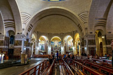 Lourdes, France - Sep 28, 2025: Interior of the Basilica in the Sanctuary of Lourdes, France. Mayor pilgrimage spot for Catholics all around the world