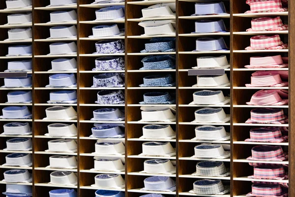 Men's shirts on a shelf — Stock Photo, Image