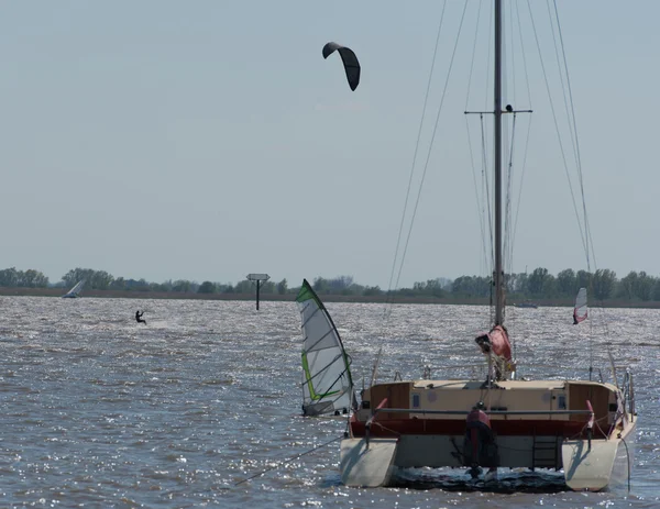 Catamaran is situated on the Elbe at anchor — Stock Photo, Image