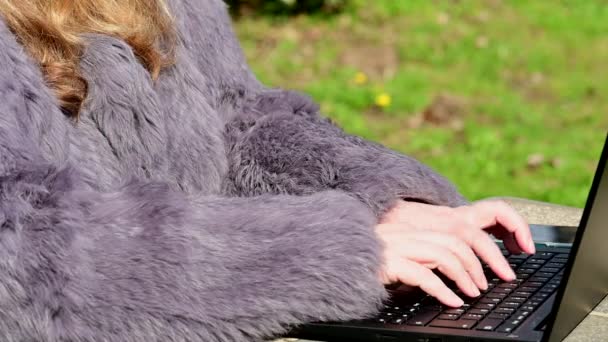 Woman Rabbit Fur Jacket Works Garden Notebook Home Office — Stock Video