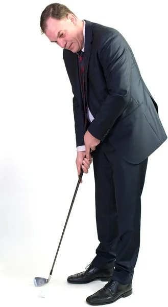 Homem de negócios jogando golfe — Fotografia de Stock