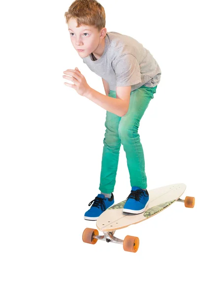 Kind auf seinem Skateboard — Stockfoto