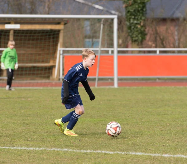 Junger Fußballspieler — Stockfoto