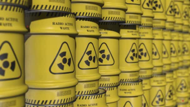 黄色の背景と放射性警告シンボルで4kビデオ. — ストック動画