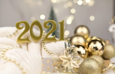 Altın Bokeh geçmişi üzerine 2021 numara. Yeni yıl havası, Noel, tebrik kartı, yeni yıl geçmişi..