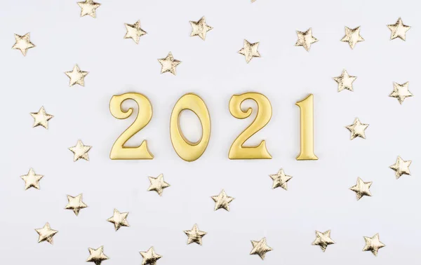 Happy New Year 2021. Sparkling numbers Year 2020 2021 isolated on white background. golden object for design holiday greeting card.