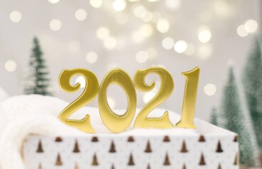 Altın Bokeh geçmişi üzerine 2021 numara. Yeni yıl havası, Noel, tebrik kartı, yeni yıl geçmişi..