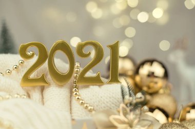 Altın Bokeh geçmişi üzerine 2021 numara. Yeni yıl havası, Noel, tebrik kartı, yeni yıl geçmişi..