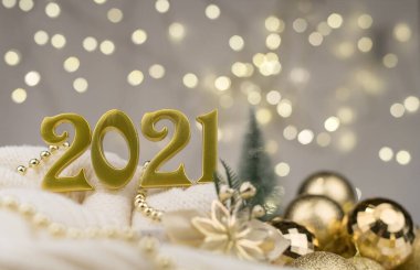 Altın Bokeh geçmişi üzerine 2021 numara. Yeni yıl havası, Noel, tebrik kartı, yeni yıl geçmişi..