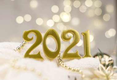 Altın Bokeh geçmişi üzerine 2021 numara. Yeni yıl havası, Noel, tebrik kartı, yeni yıl geçmişi..