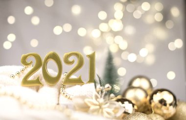 Altın Bokeh geçmişi üzerine 2021 numara. Yeni yıl havası, Noel, tebrik kartı, yeni yıl geçmişi..