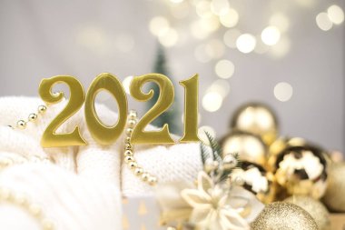 Altın Bokeh geçmişi üzerine 2021 numara. Yeni yıl havası, Noel, tebrik kartı, yeni yıl geçmişi..