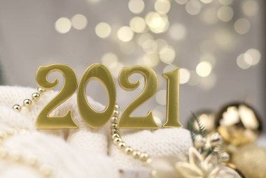 Altın Bokeh geçmişi üzerine 2021 numara. Yeni yıl havası, Noel, tebrik kartı, yeni yıl geçmişi..