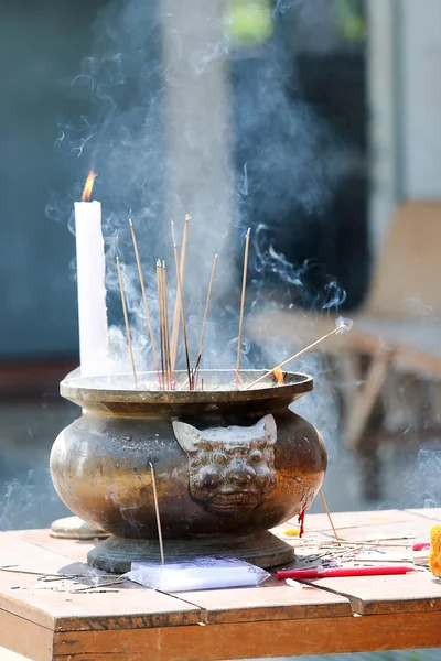 Prayers burning incense — Stock Photo, Image