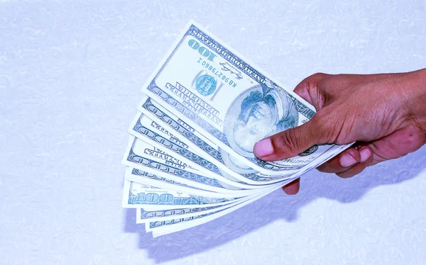 Viszont a dollár bankjegyek a kék fény — Stock Fotó