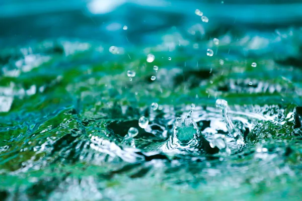 Blurred Rain on water — Stock Photo, Image