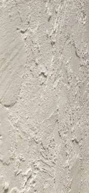 Yıpranmış beton duvar yüzeyine yakın çekim. Dayanıklılık ve mimari yapı.