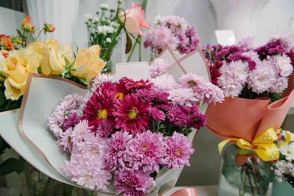 Flower shop concept. Many different bouquets of flowers in a flower shop.beautiful colorful flowers in flower shop