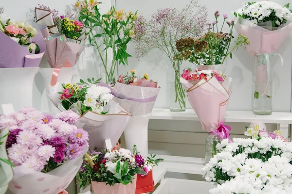 Flower shop concept. Many different bouquets of flowers in a flower shop.beautiful colorful flowers in flower shop