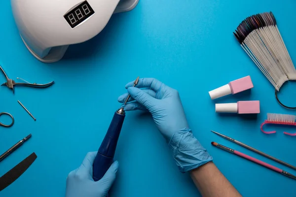 Conjunto Herramientas Accesorios Manicura Sobre Fondo Azul Plano Lay Top —  Fotos de Stock