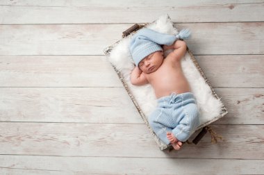 Sleeping Newborn Baby Wearing Pajamas clipart