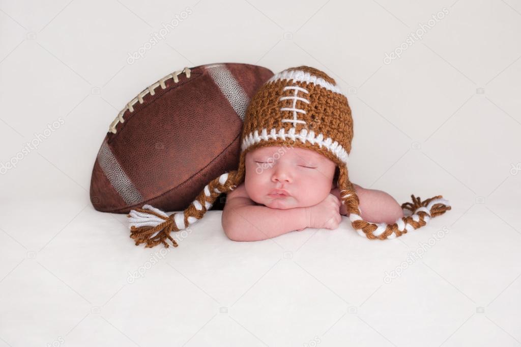Newborn Baby Boy Wearing a Crocheted Football Hat