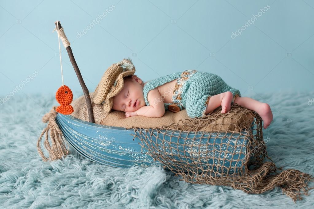 Newborn Baby Boy in Fisherman Outfit — Stock Photo © katrinaelena #91054116