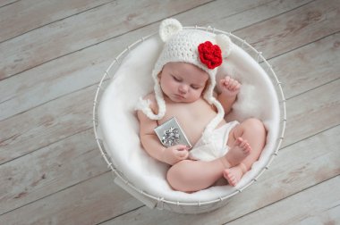Baby Wearing a Christmas Bear Hat