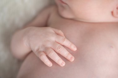 Close-up Shot of a Newborn Baby Boy's Hand
