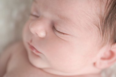 Close-up Shot of a Newborn Baby Boy's Face