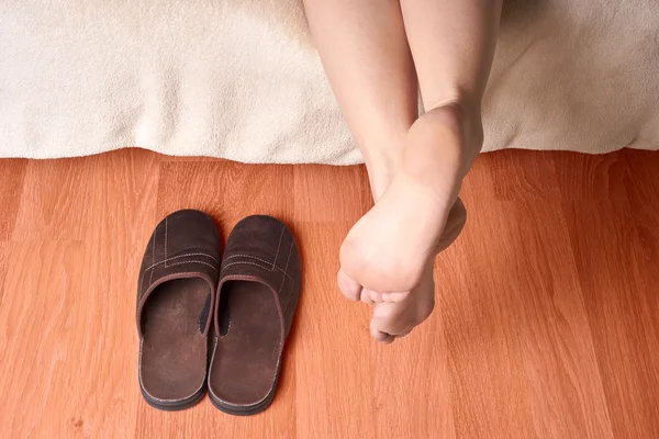 Female feet and slippers — Stock Photo, Image