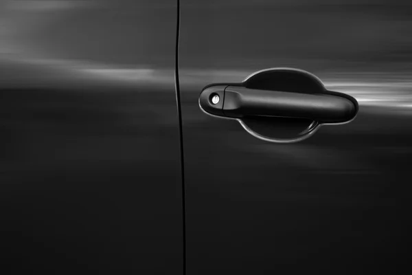 Driver 's door of a black car — стоковое фото