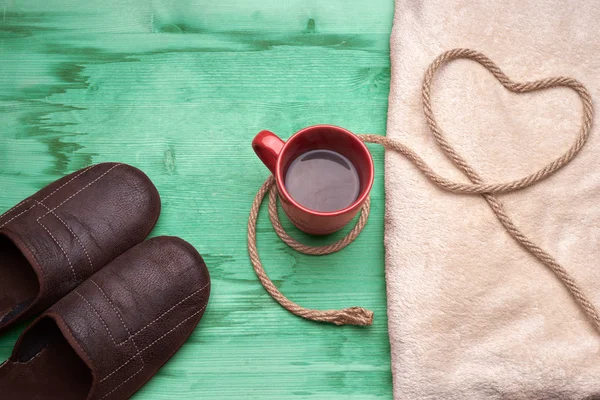 A cup of coffee on the wooden table